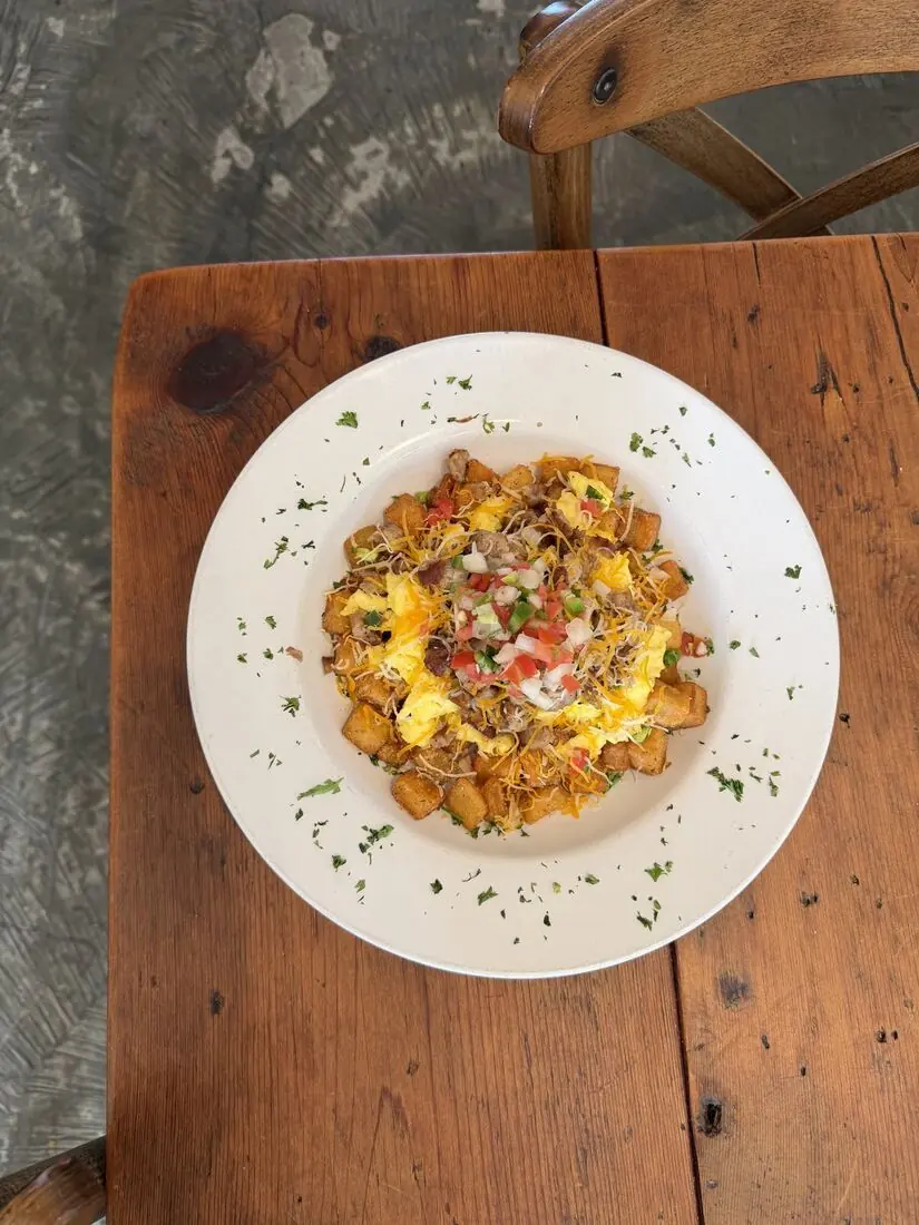 Breakfast bowl with potatoes, eggs and pico