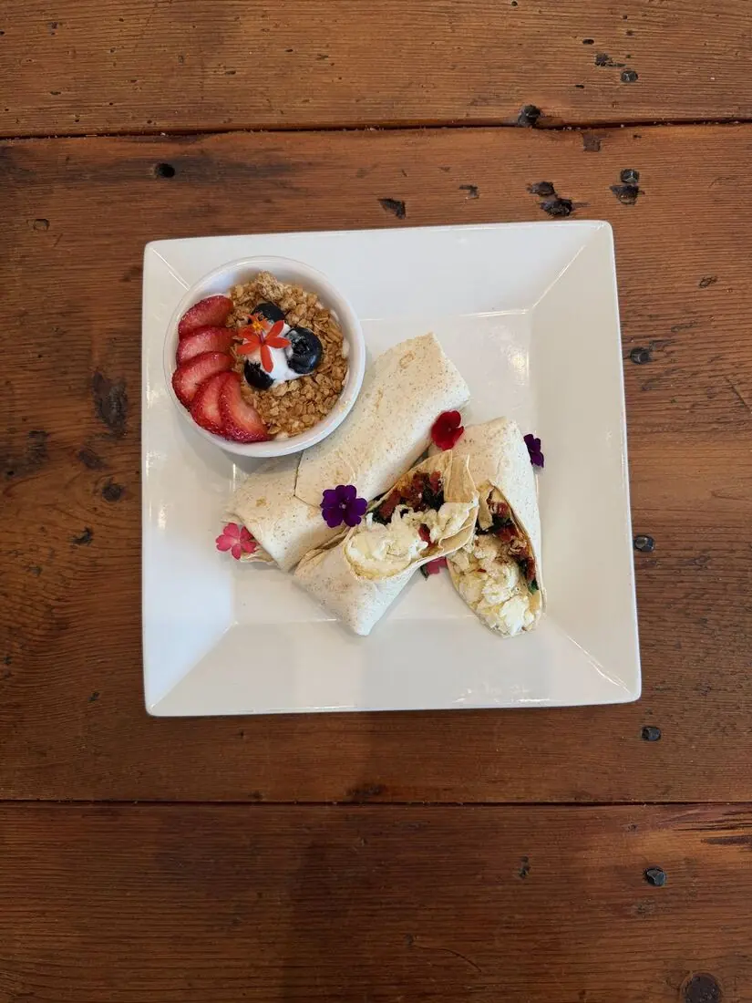 Egg white wrap with a fruit and granola cup