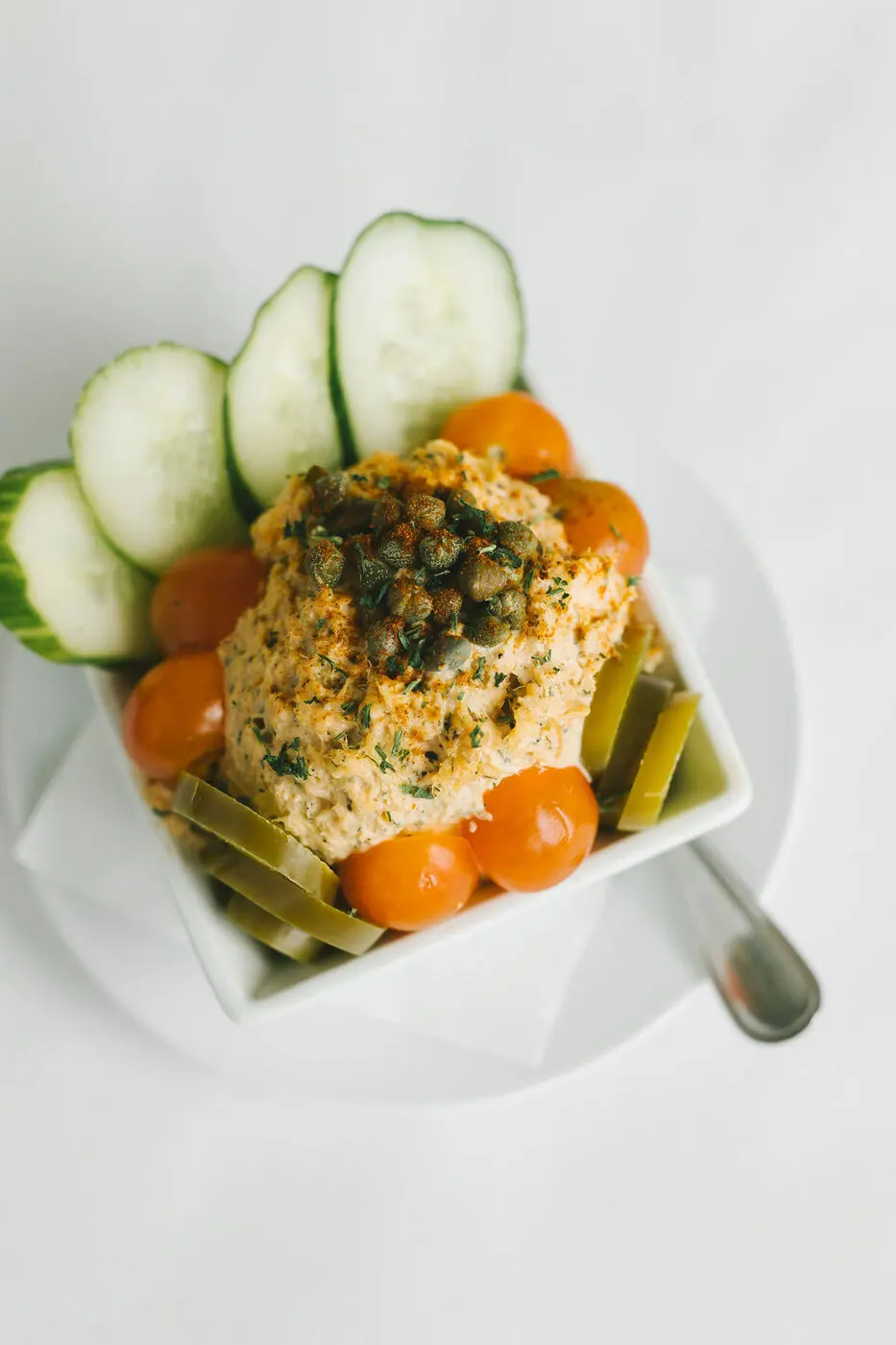 Smoked salmon dip with crackers and vegetables
